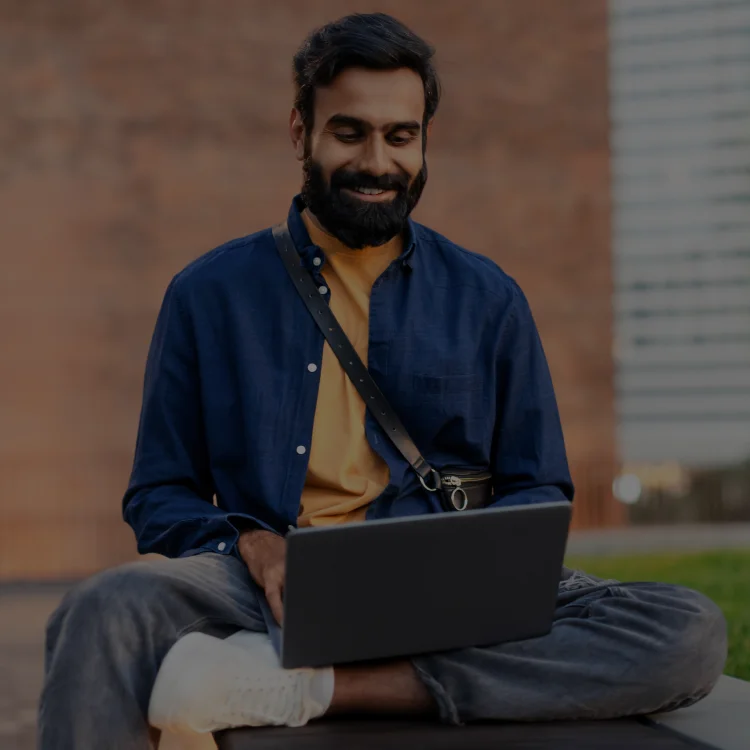 Student working in his laptot