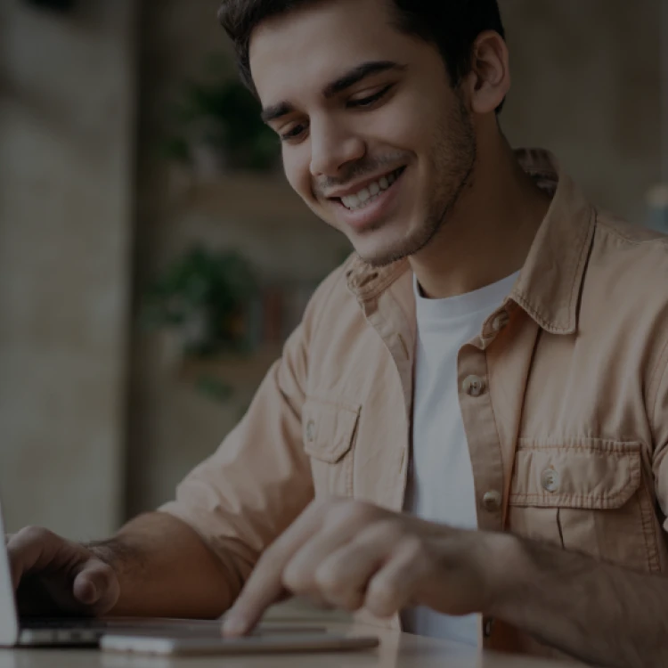 Student working in his laptot