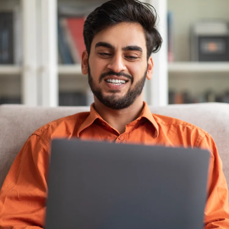 Student working in his laptot