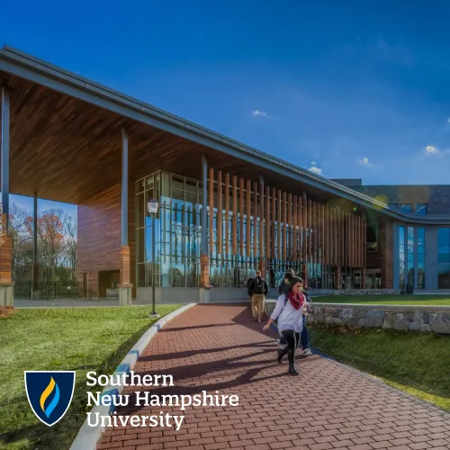 Photograph of students walking at the entrance to the Campus